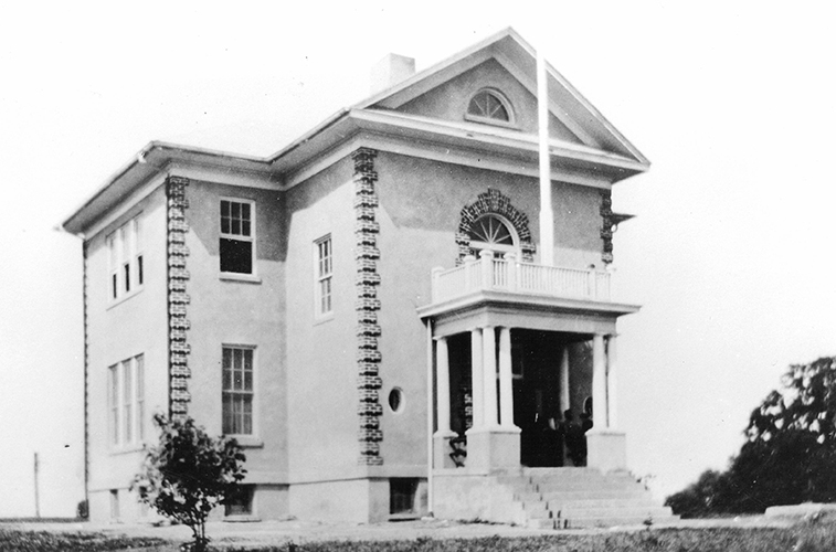 Black and white photograph of the two-room Andrew Chapel School.